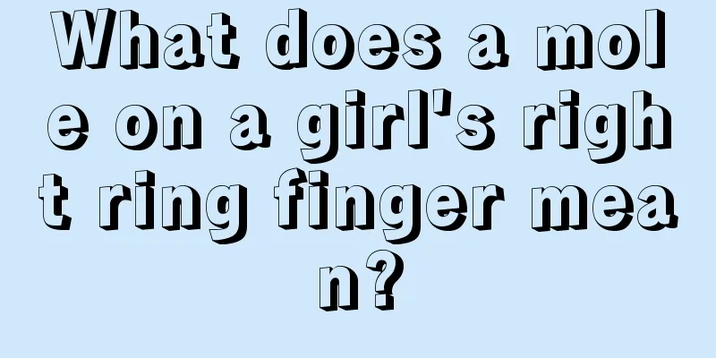 What does a mole on a girl's right ring finger mean?