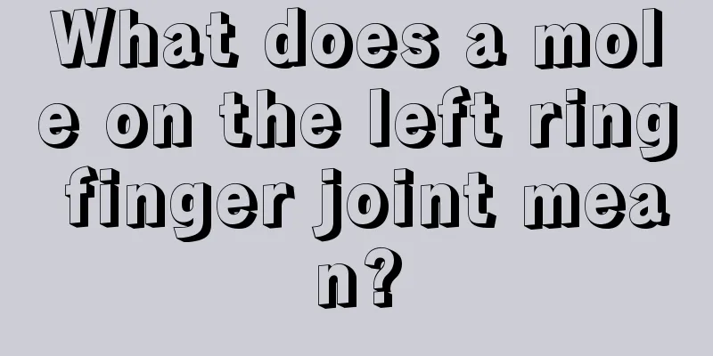What does a mole on the left ring finger joint mean?