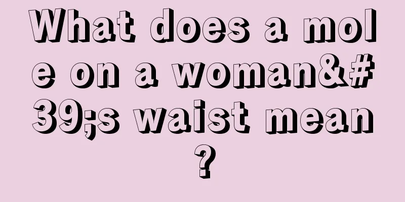 What does a mole on a woman's waist mean?