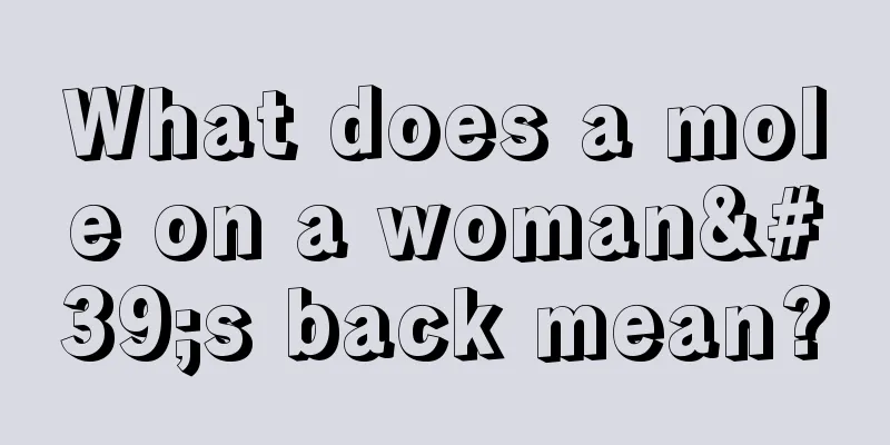 What does a mole on a woman's back mean?