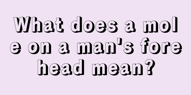 What does a mole on a man's forehead mean?