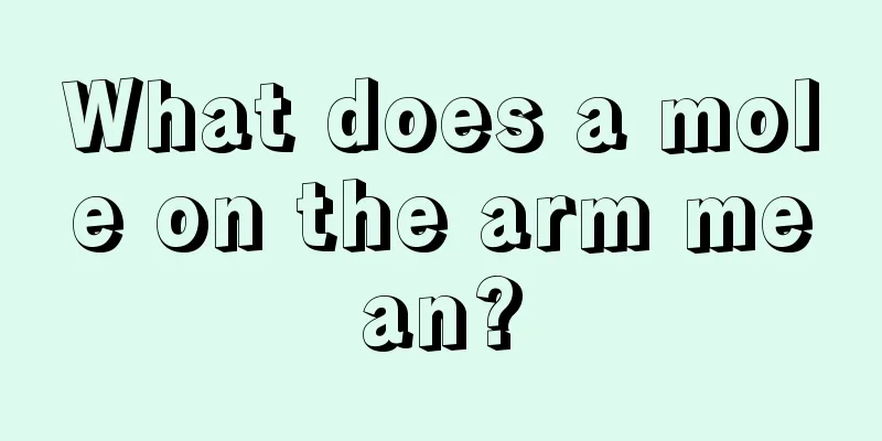 What does a mole on the arm mean?