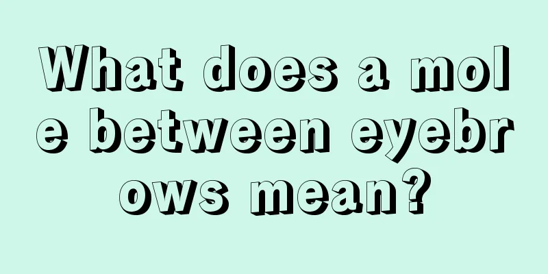 What does a mole between eyebrows mean?