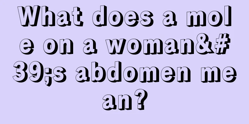 What does a mole on a woman's abdomen mean?