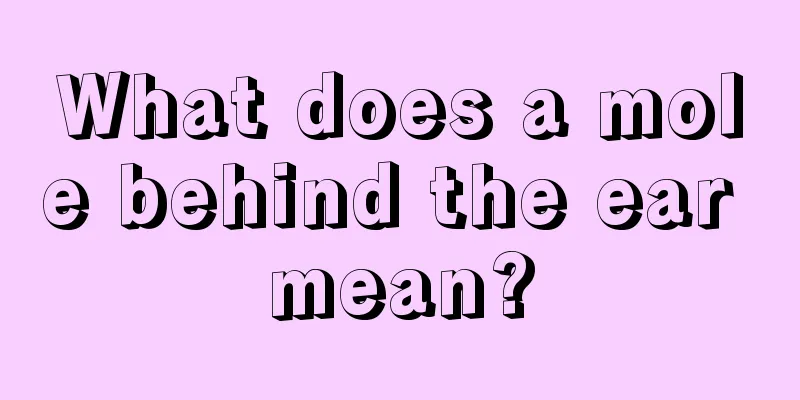 What does a mole behind the ear mean?