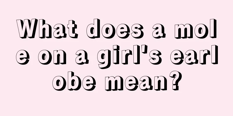 What does a mole on a girl's earlobe mean?