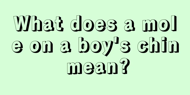 What does a mole on a boy's chin mean?
