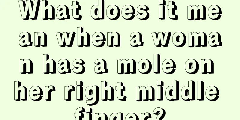 What does it mean when a woman has a mole on her right middle finger?