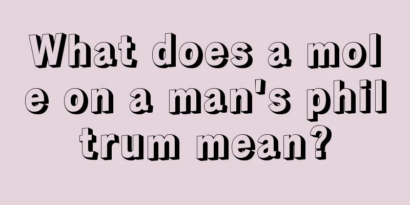 What does a mole on a man's philtrum mean?