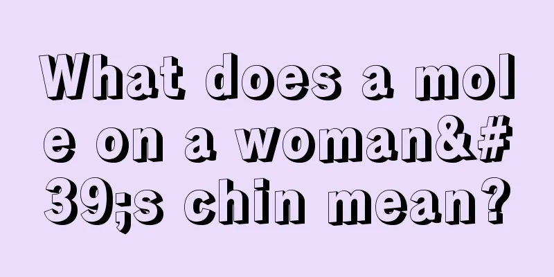 What does a mole on a woman's chin mean?