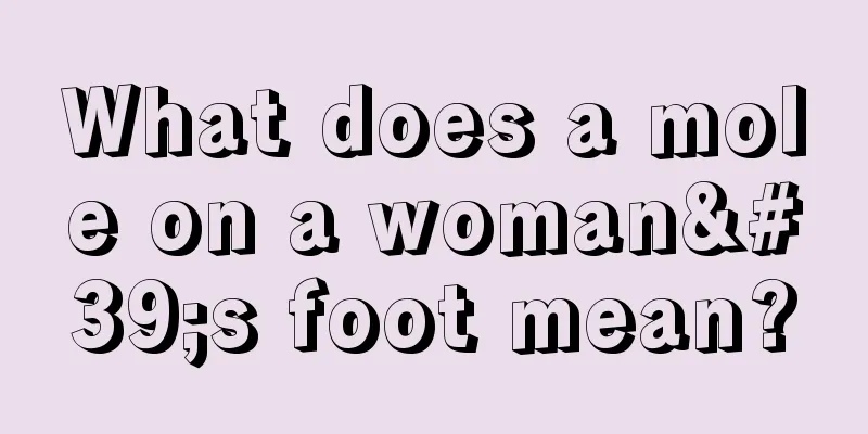 What does a mole on a woman's foot mean?