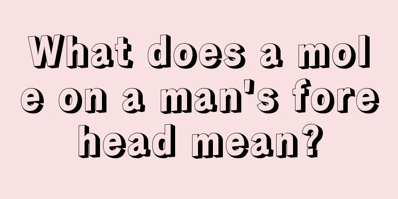 What does a mole on a man's forehead mean?
