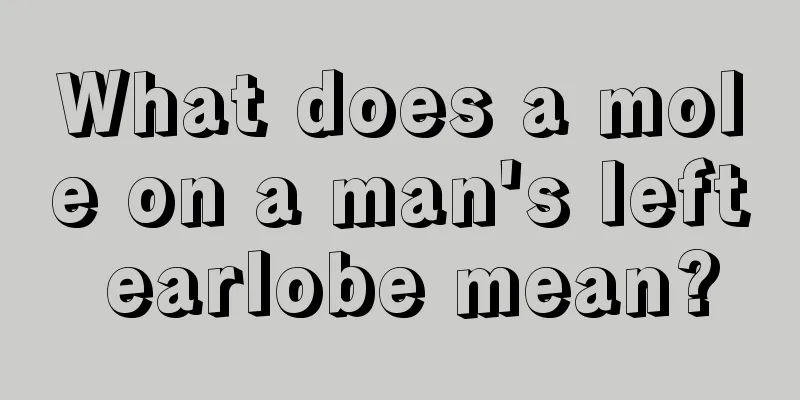 What does a mole on a man's left earlobe mean?