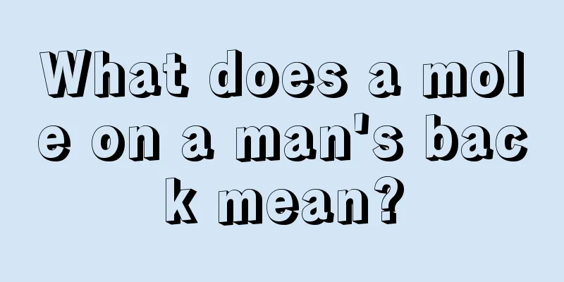 What does a mole on a man's back mean?