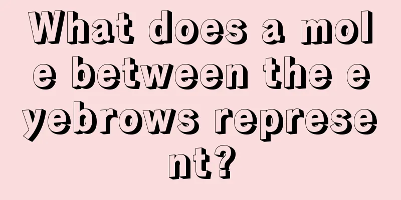 What does a mole between the eyebrows represent?