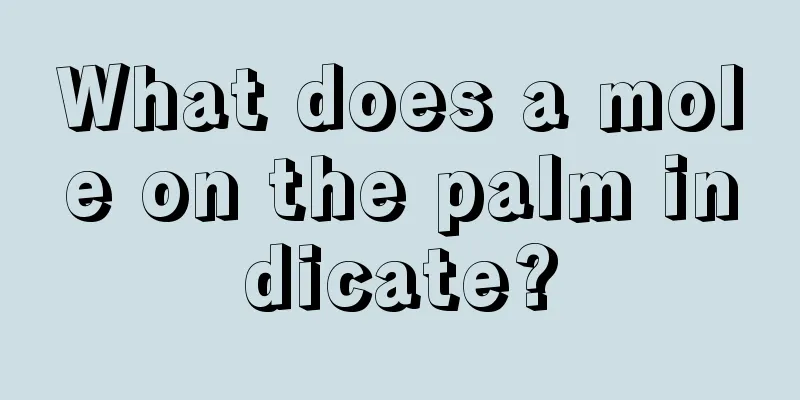 What does a mole on the palm indicate?