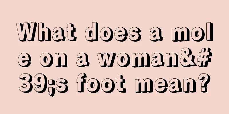 What does a mole on a woman's foot mean?