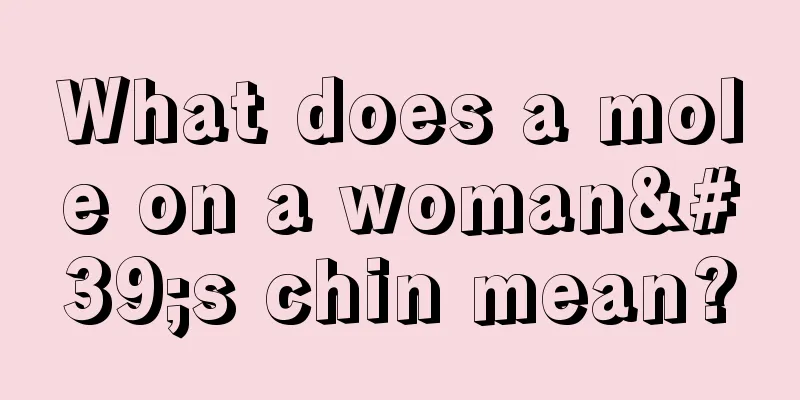 What does a mole on a woman's chin mean?