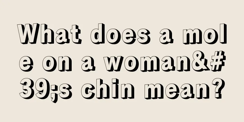 What does a mole on a woman's chin mean?