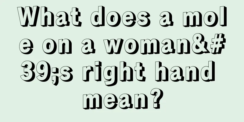 What does a mole on a woman's right hand mean?