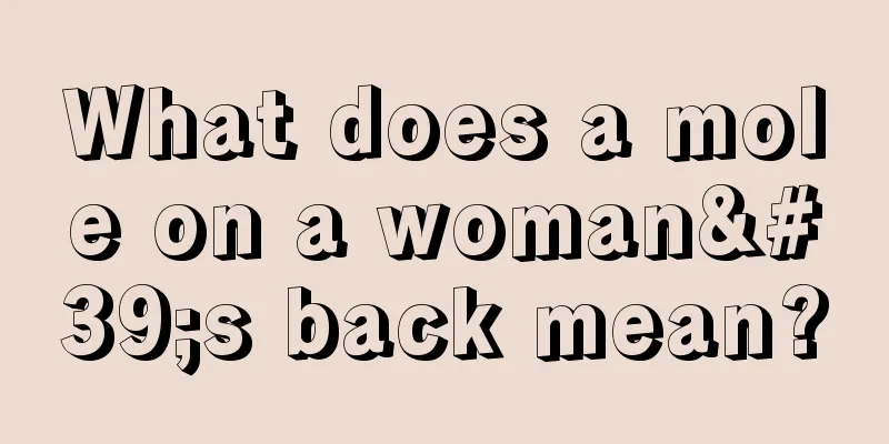 What does a mole on a woman's back mean?