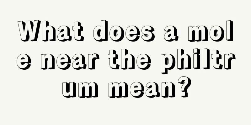 What does a mole near the philtrum mean?