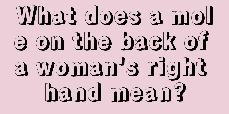 What does a mole on the back of a woman's right hand mean?