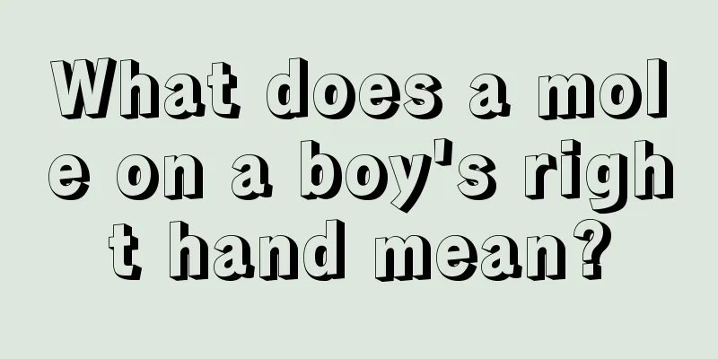 What does a mole on a boy's right hand mean?