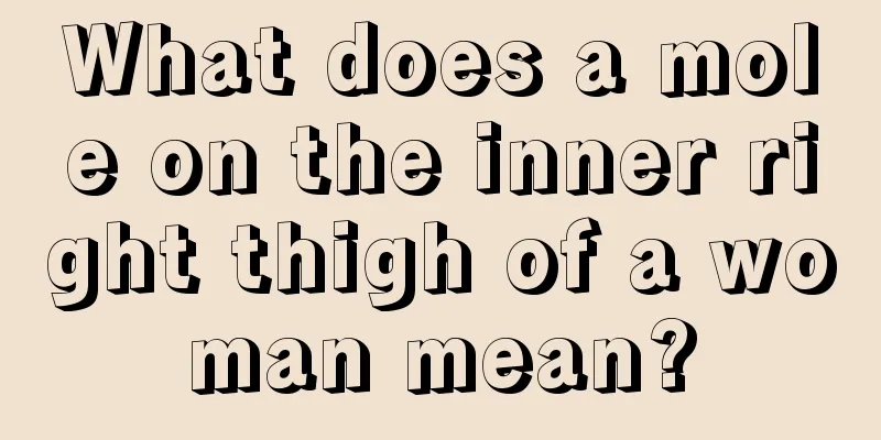 What does a mole on the inner right thigh of a woman mean?