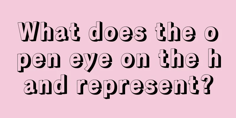 What does the open eye on the hand represent?