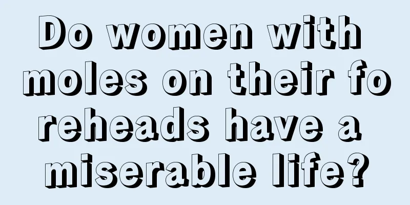 Do women with moles on their foreheads have a miserable life?