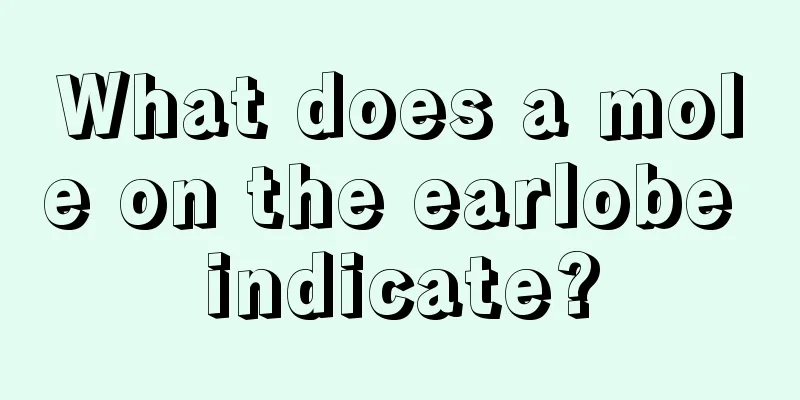 What does a mole on the earlobe indicate?