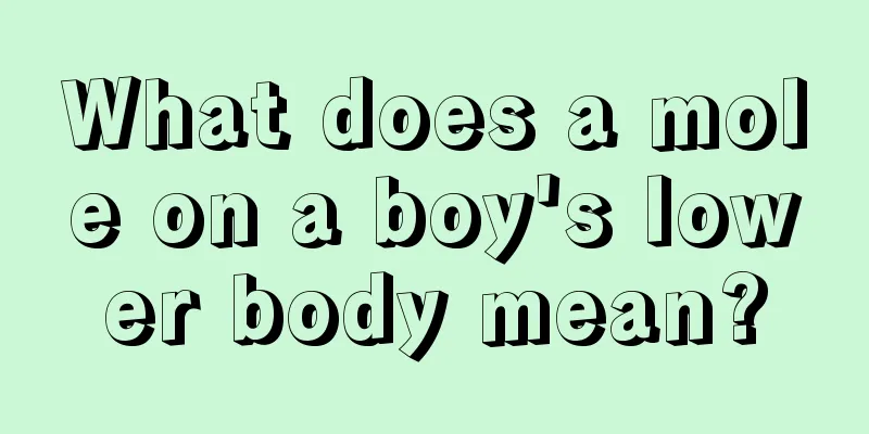What does a mole on a boy's lower body mean?