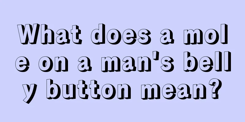 What does a mole on a man's belly button mean?