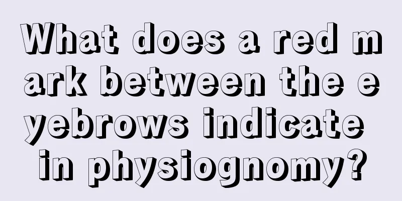 What does a red mark between the eyebrows indicate in physiognomy?