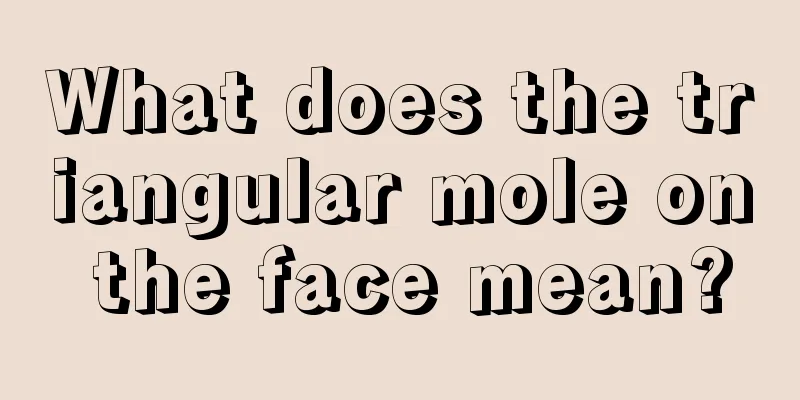 What does the triangular mole on the face mean?