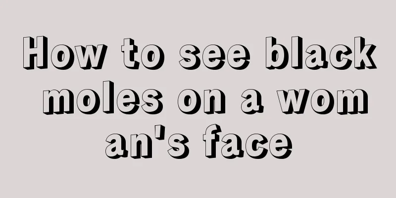 How to see black moles on a woman's face