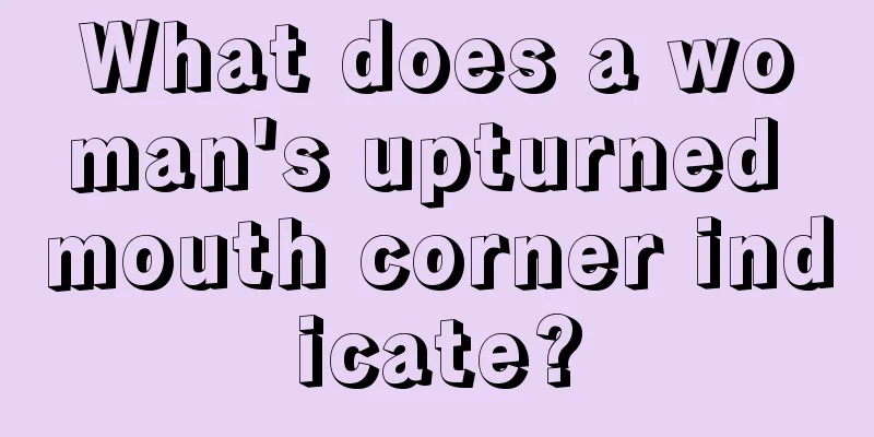 What does a woman's upturned mouth corner indicate?