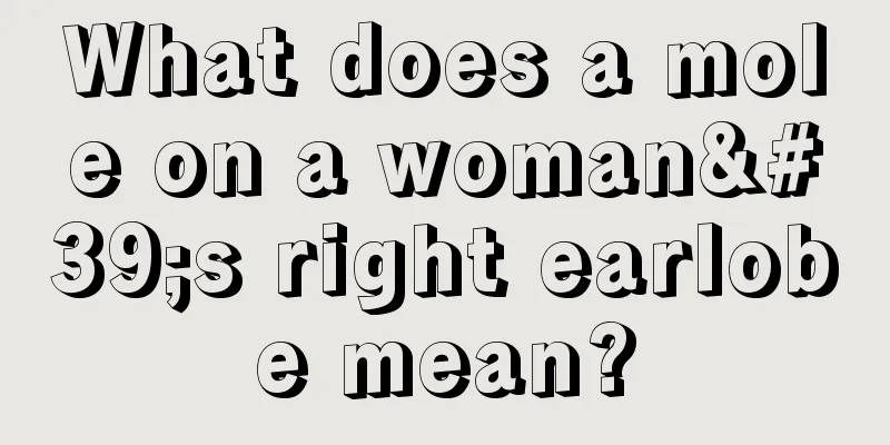 What does a mole on a woman's right earlobe mean?