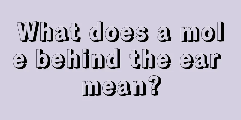 What does a mole behind the ear mean?