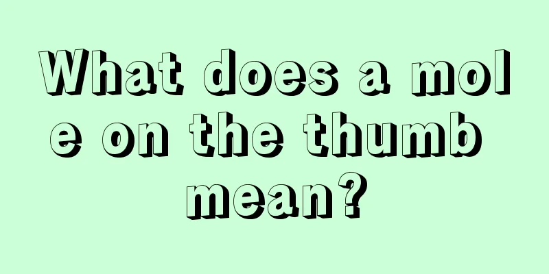 What does a mole on the thumb mean?