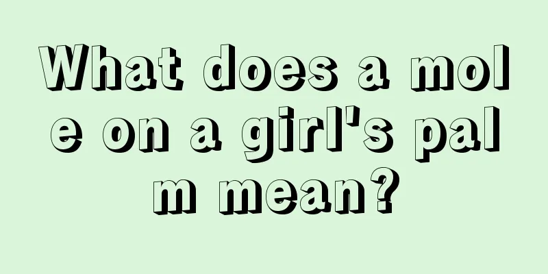 What does a mole on a girl's palm mean?