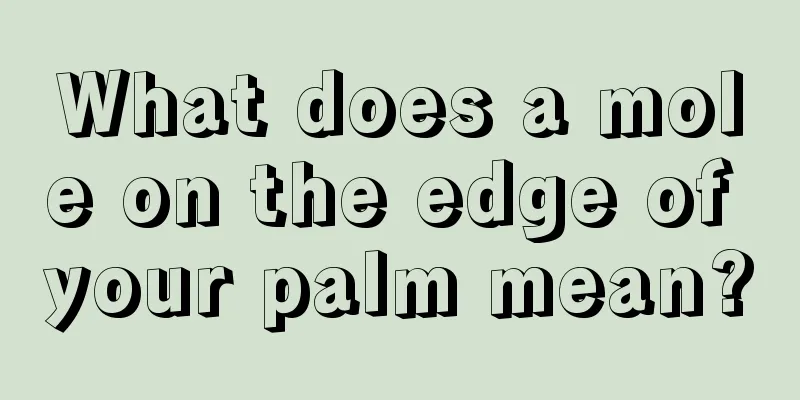 What does a mole on the edge of your palm mean?
