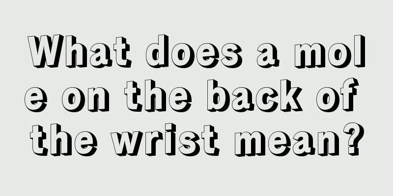 What does a mole on the back of the wrist mean?