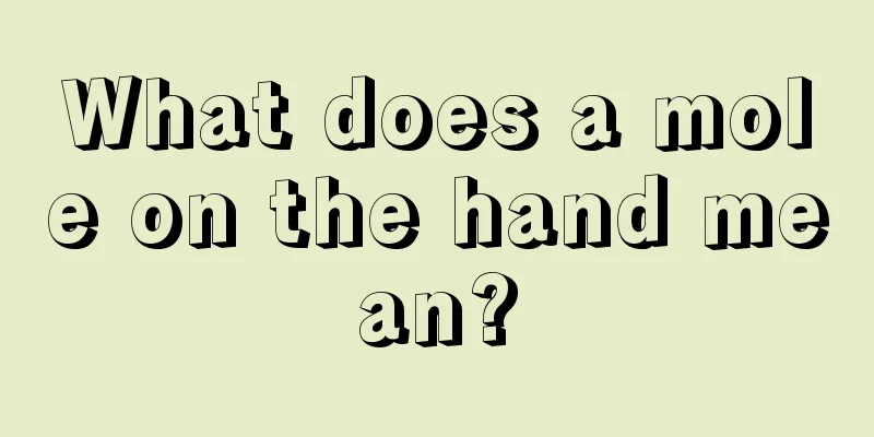 What does a mole on the hand mean?