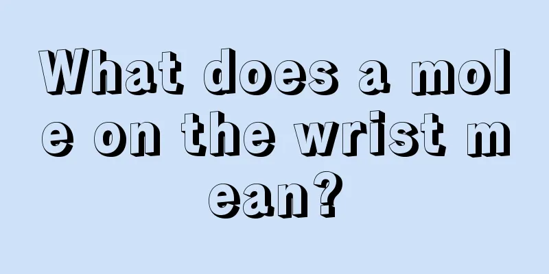 What does a mole on the wrist mean?