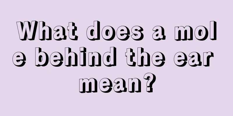 What does a mole behind the ear mean?