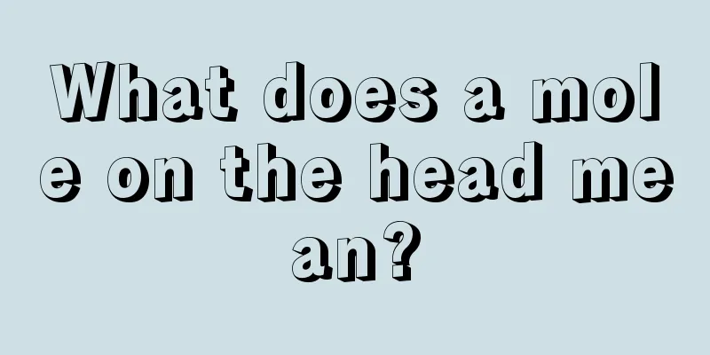 What does a mole on the head mean?