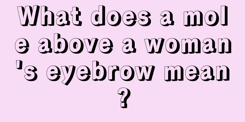 What does a mole above a woman's eyebrow mean?