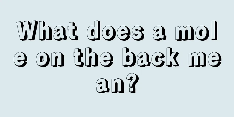 What does a mole on the back mean?